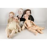 A collection of 5 German bisque headed dolls, one