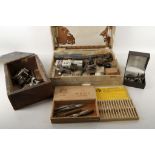 A small collection of watchmaker's equipment inclu