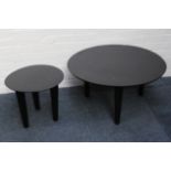 A pair of modern contemporary circular ebonised tables, designed by Patty Johnson and manufactured