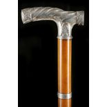 A WHITE METAL HANDLED MALACCA DAY CANE. Circa 1880