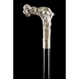 A 19TH CENTURY FIGURAL WALKING CANE. With silver p