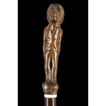 A FOLK ART ROSEWOOD WALKING CANE The knop carved a