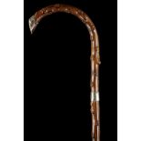 A 19TH CENTURY HAWTHORN CROOK WALKING STICK. With