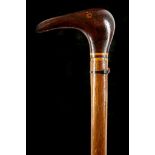 A FOLK ART HARDWOOD CROP HANDLED WALKING STICK The