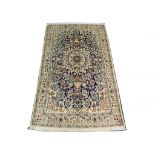 Persian Nain wool and silk rug. 2.00m x 1.20m. Con