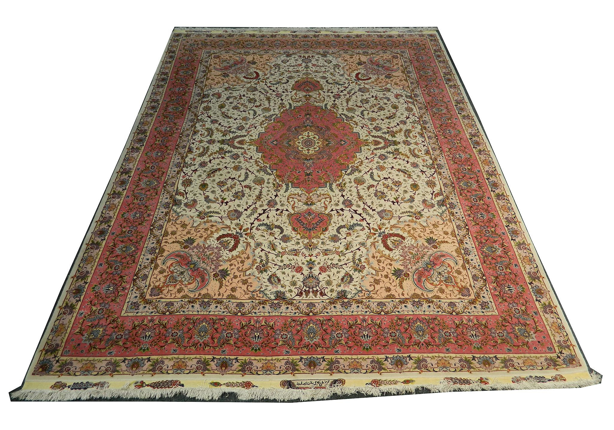 A fine 50 Raj wool and silk, Tabriz carpet with si