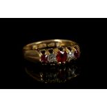 A Victorian 18ct gold, ruby and diamond five stone