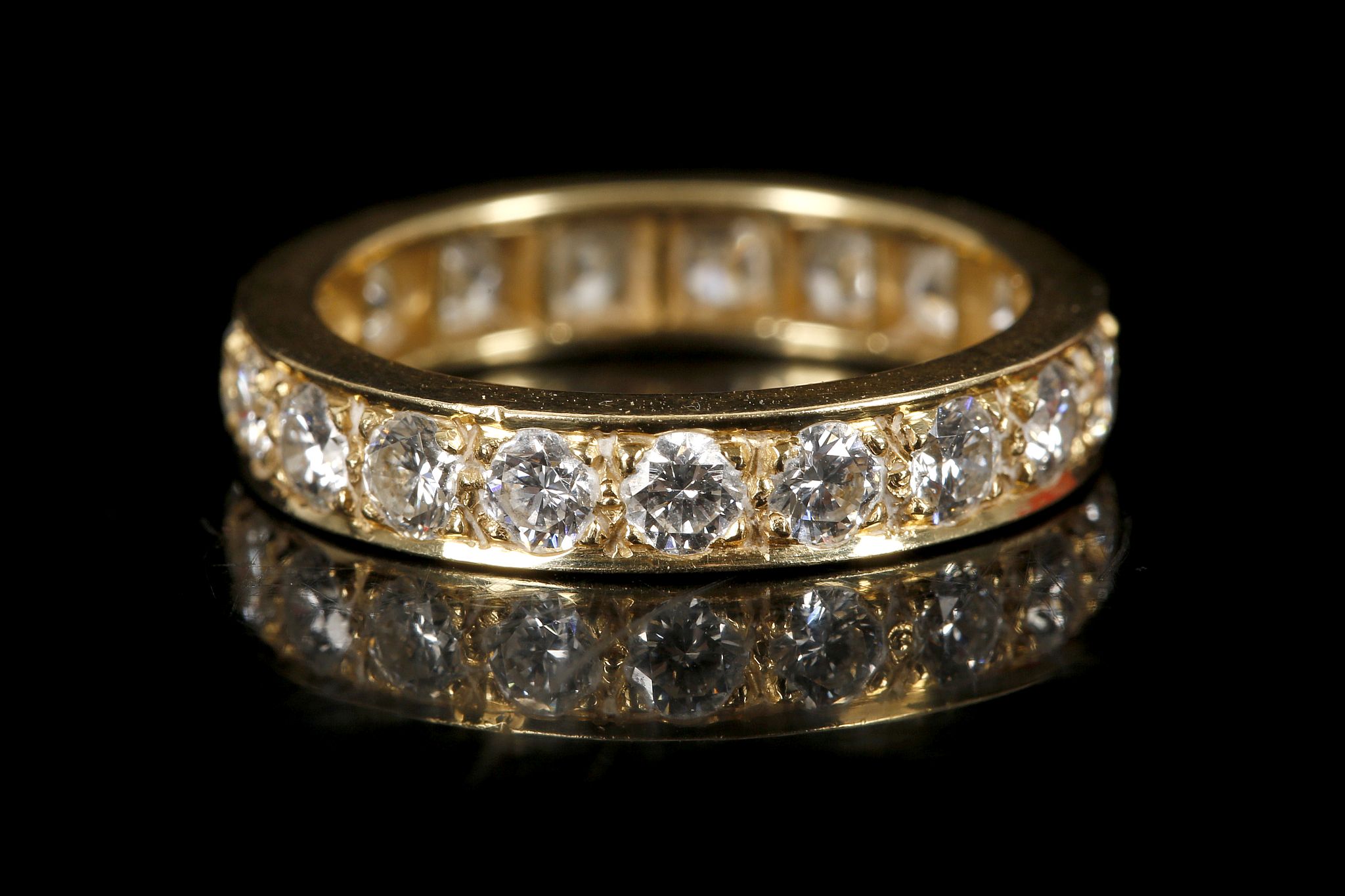 An 18ct yellow gold and diamond set full eternity