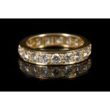 An 18ct yellow gold and diamond set full eternity