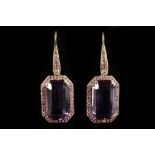 A pair of 18 carat yellow gold, pink sapphire, and