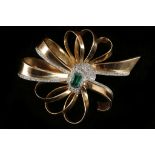 A c.1940's 18ct gold ribbon spray brooch, centred