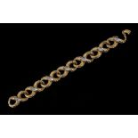 A c.1970's 18ct yellow gold and diamond set bracel