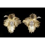 A pair of 18ct gold floral clip earrings, with pla