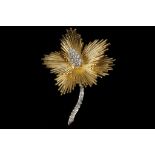 A heavy 18ct gold floral brooch, with platinum and