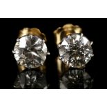 A pair of 18ct gold and diamond stud earrings, cla