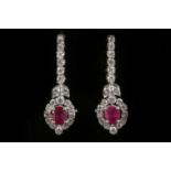 A pair of 18 carat white gold, ruby, and diamond f