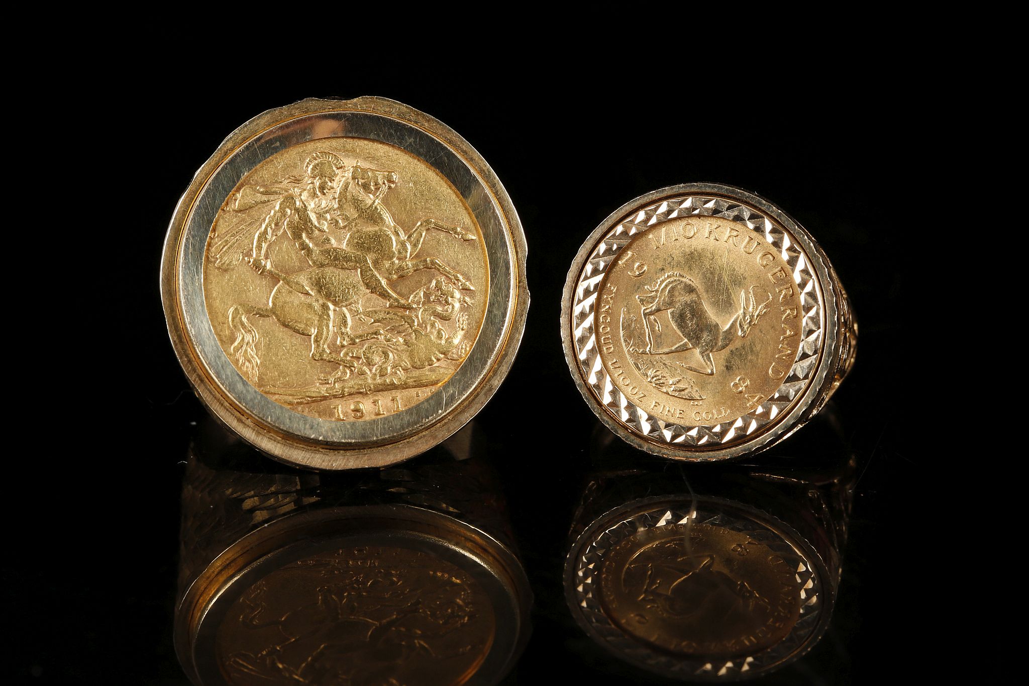 A 9ct gold ring, mounted 1911 full gold sovereign,