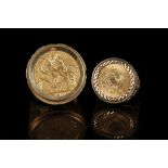A 9ct gold ring, mounted 1911 full gold sovereign,