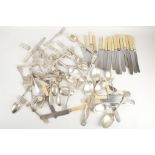 A quantity of silver plated flatware, knives, forks and spoons.