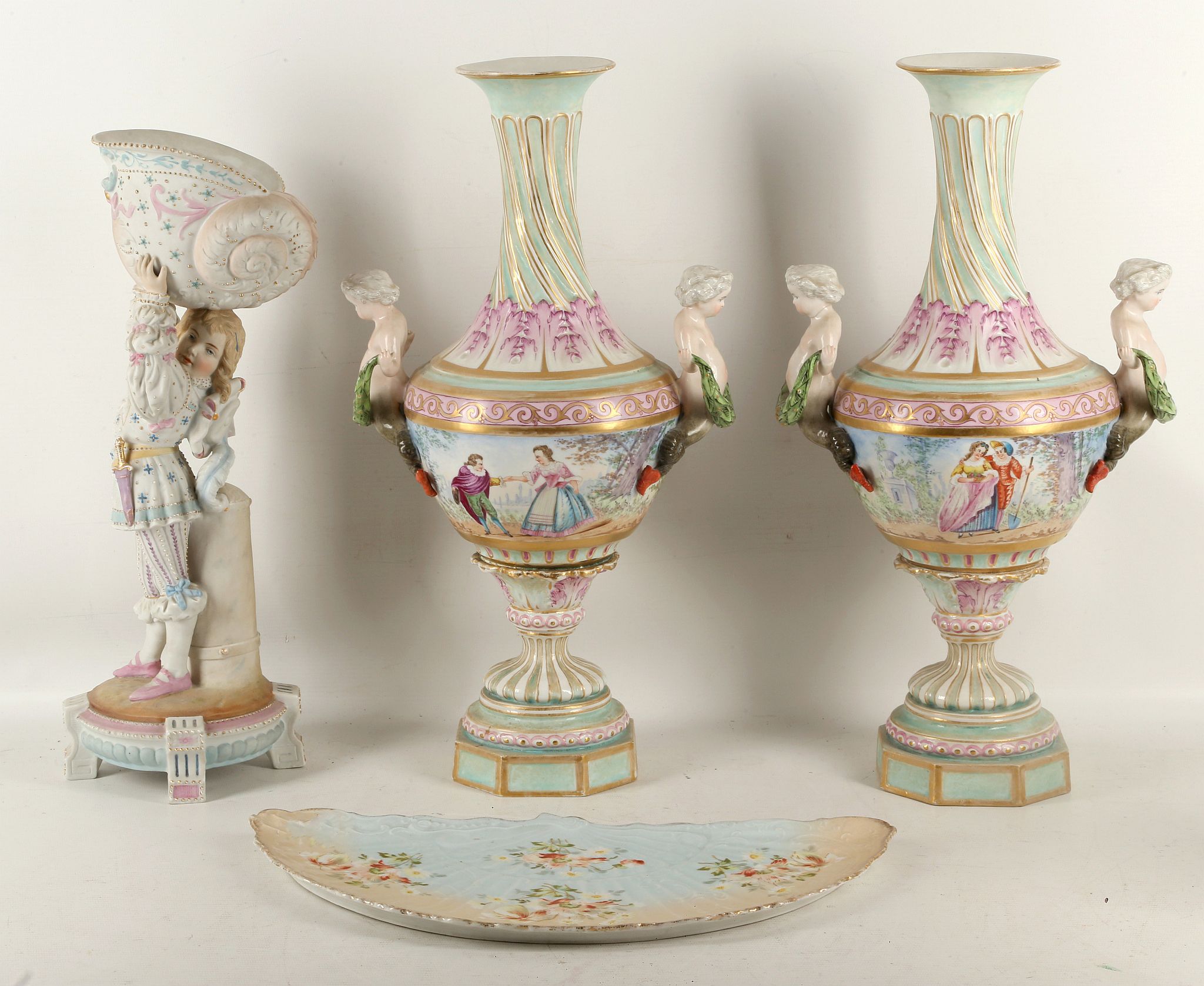 A large pair of Dresden urns, the centres painted