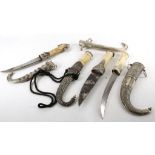 Four bone handle Islamic khanjar daggers, turquois