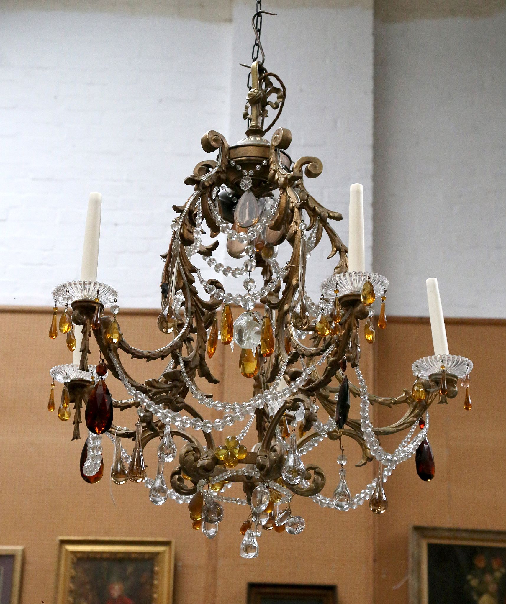 A French 5 branch gilded metal chandelier with ela