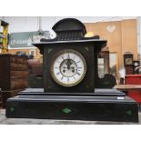 A very large Victorian black marble mantel clock.
