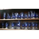 Ten place setting of blue Gordiola glasses, champa