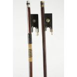 Two German nickel mounted, round Brazil wood violin bows. One stamped, Paganini (Weight 55.5g) The