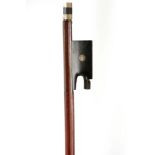 An interesting violin bow, in a Vuillaume style. Nickel mounted (missing ferrule) with ebony frog.