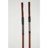 Two German Pernambuco wood round stick violin bows. One has a crack in the middle of the stick.