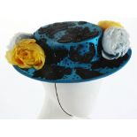 ANYA CALIENDO 'A MATADOR'S MISTRESS' COUTURE HAT, bright blue silk with black lace detail and yellow