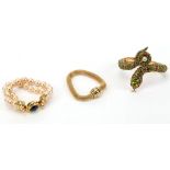 THREE VINTAGE BRACELETS, to include a Butler and Wilson bejewelled snake cuff, a Kenneth J Lane faux