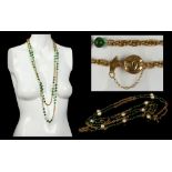 CHANEL LONG NECKLACE, dated 1984, faux baroque pearls with green glass beads, 180cm long overall