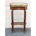 A French style gilt metal mounted, marble topped kidney shaped two tiered gueridon with frieze