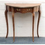 A French style kingwood and parquetry demi-lune side table with frieze drawer, raised on cabriole