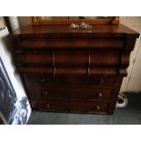 A mid Victorian Scottish tall mahogany chest of three long and three short drawers, raised on four