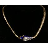 A Victorian yellow gold, diamond, and blue enamel snake necklace, having articulated chain, the