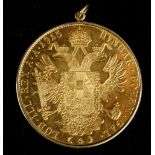 An Austrian 1915 4 ducat coin (restrike), in a 14 carat yellow gold pendant mount. Weight: 15.4g