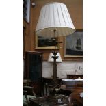 A pair of brass table lamps of Italian influence, leaf capital, collar and decoration to leaf