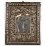 An Edwardian rolled paper picture frame set within