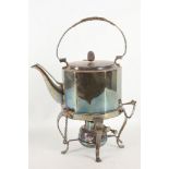A silver plated spirit kettle complete with burner and stand.