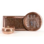 Three copper items; a rectangular tray embossed in Arts and Crafts style with flowers and foliage,