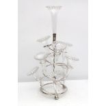 Early 20th century epergne, white metal spiral with 10 frill trumpets, 43.5cm.