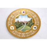 A Buckingham Palace porcelain charger, finely painted with a view of Windsor Castle by L. Sykes,