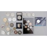 A collection of white metal, silver and bronze commemorative coinage, including Royal Mint, American