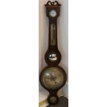 A Georgian mahogany banjo barometer.