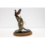 F. Divita, a limited edition (38 of 150) cold painted bronze study of a pheasant among bullrushes,