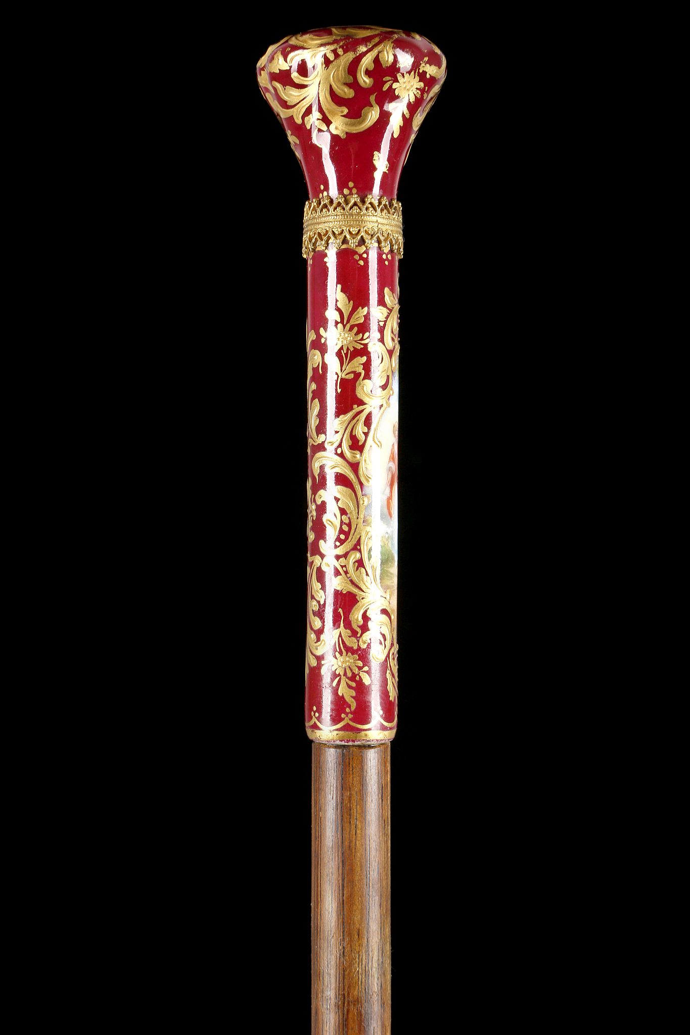 A CONTINENTAL PORCELAIN AND HARDWOOD CANE. The elongated handle with painted panels depicting an - Image 2 of 7