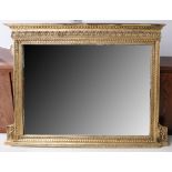 An Edwardian gilt framed overmantle mirror with bevelled glass. 110x 93cm